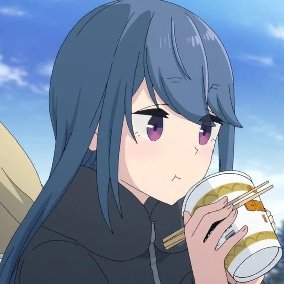 Rin happily eating a cup of noodles